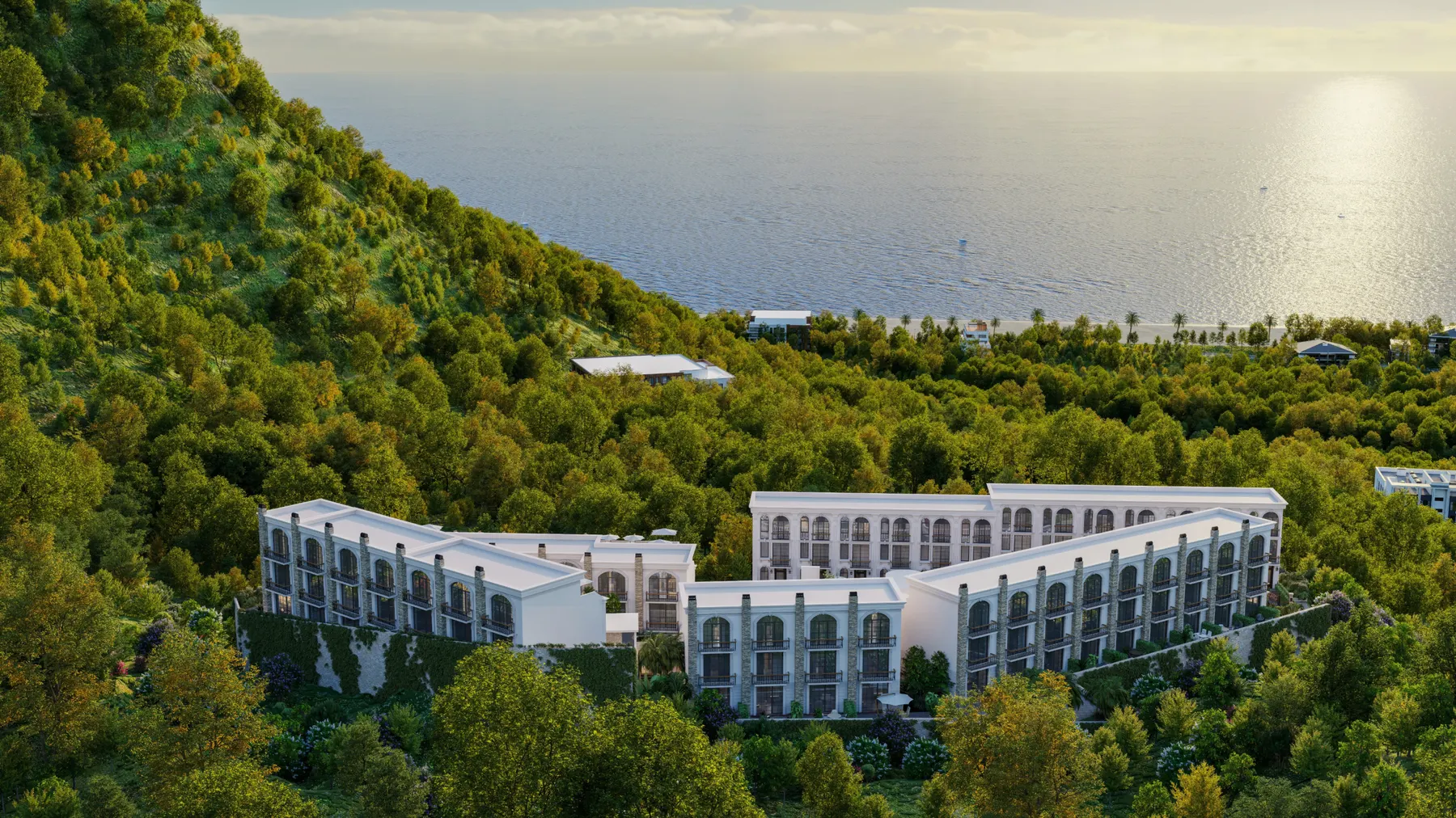 Таунхаусы Riviera на склоне среди леса, вид с воздуха, море на горизонте